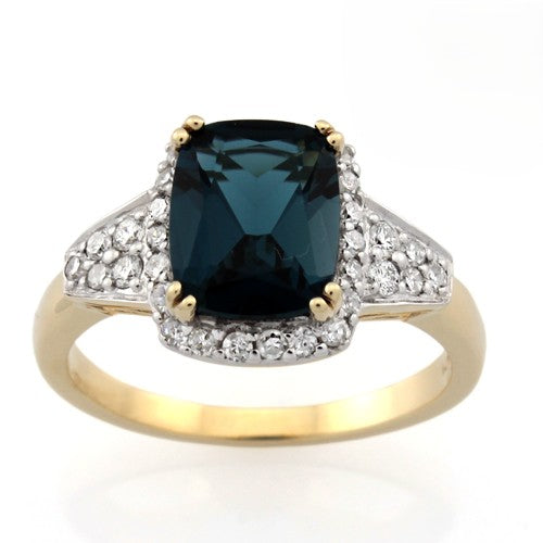 9CT YELLOW GOLD LONDON BLUE TOPAZ & DIAMOND RING. 22=0.198CT, 4=0.072CT, 6=0.060CT H P1 LBT=2.60CT Size N