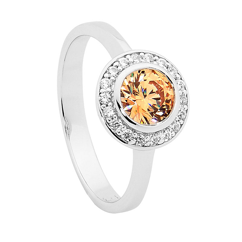 SS ROUND FANCY YELLOW CZ SOL W/WH CZ CLAW SURROUND RING SIZE 9