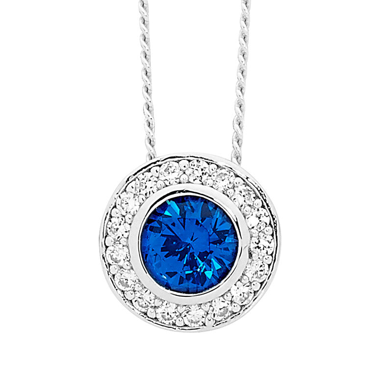 SS Round Dark Blue CZ Sol. w/ WH CZ Claw Surround Pendant