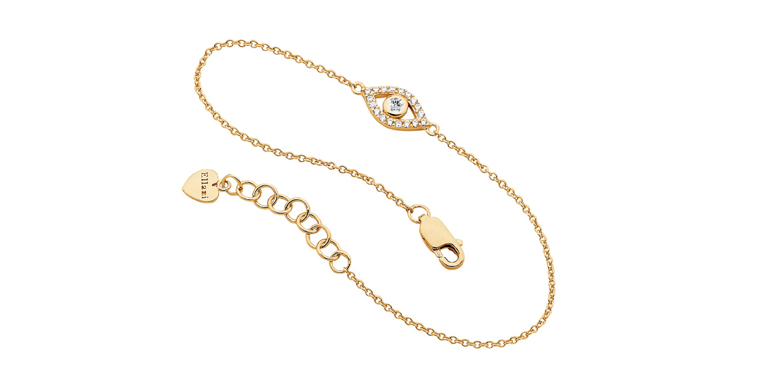 SS wh cz bezel set evil eye bracelet w/gold plating
