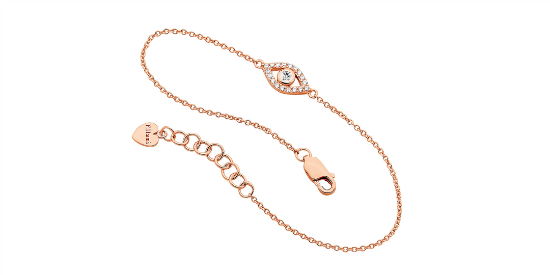 SS wh cz bezel set evil eye bracelet w/rose gold plating